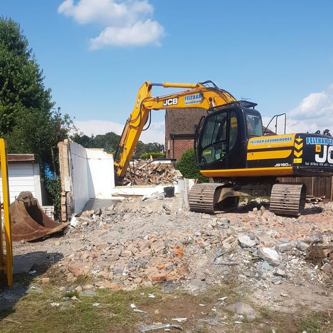 House Demolition Project Using Excavator