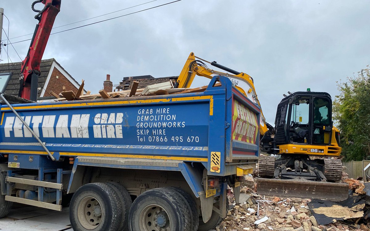 https://feltham-demolition.co.uk/wp-content/uploads/2026/01/Waste-Muck-Away-Grab-Lorry-Aldershot.jpg